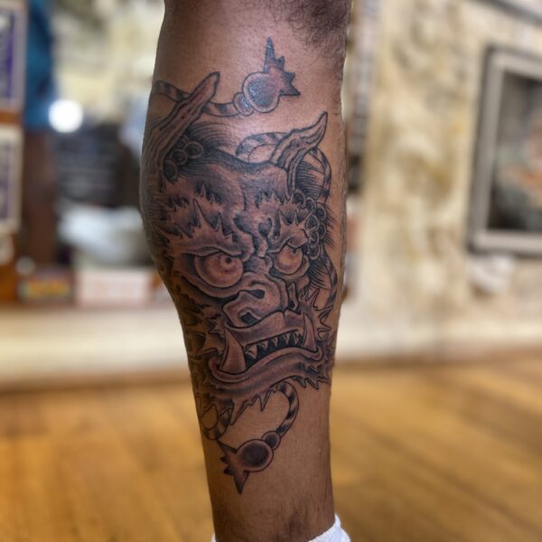 Freehand Oni Mask, drawn straight on the skin by Antony Dickinson at Nowhere Gallery. The design pulls influence from bold traditional and Japanese tattoo motifs and styles