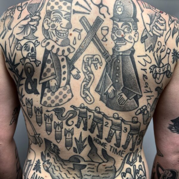 Hand-poked tattoo by Adam Sage, featuring smooth, precise linework and strong graphic composition. Inspired by brutalist architecture, children’s book illustration, and Soviet poster design, Adam creates timeless, non-electric tattoos with bold, simple forms.