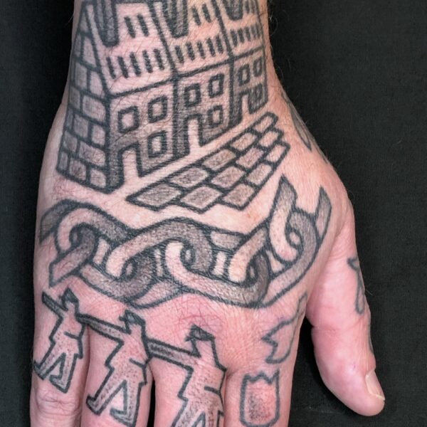 Hand-poked tattoo by Adam Sage, featuring smooth, precise linework and strong graphic composition. Inspired by brutalist architecture, children’s book illustration, and Soviet poster design, Adam creates timeless, non-electric tattoos with bold, simple forms.