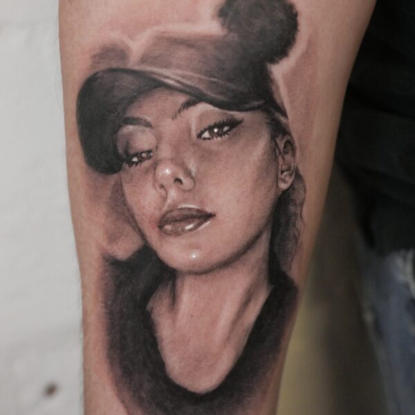 Realistic portrait tattoo by Brighton based tattoo artist Alex Rufio. Alex has over a decade of experience creating hyper realistic tattoos. His practice is influenced by Renaissance masters classical post-war artists, and often. tattoos scenes or elements taken from such works.