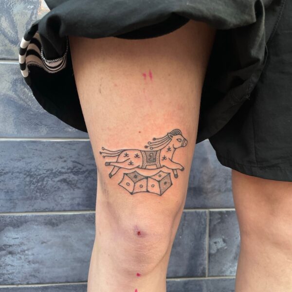 Rhianna I'Anson is a tattoo artist with a great sensibility and approach to creating works which are gentle, feminine, and organic. This horse and dice piece was created by a stick and poke processes, whereby an artist will use needles bound to a stick, gently puncturing the skin to insert the ink.
