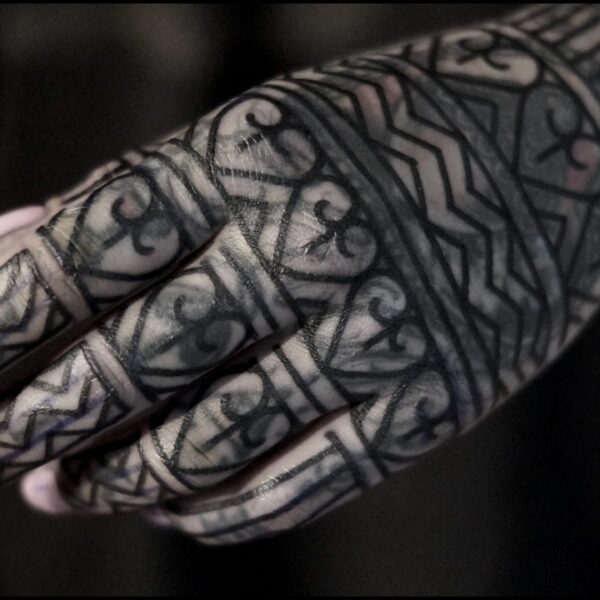 Bold blackwork tattoo by Francesco Capro, featuring strong ornamental patterns and timeless design. Francesco, originally from Northern Italy, works from Nowhere Tattooing in Brighton and Seven Doors Tattoo in London, bringing over thirteen years of experience and a passion for powerful, culturally rich tattoo art.