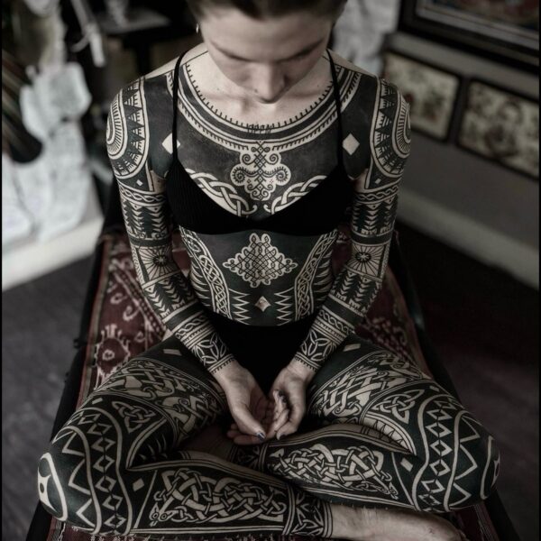 Bold blackwork tattoo by Francesco Capro, featuring strong ornamental patterns and timeless design. Francesco, originally from Northern Italy, works from Nowhere Tattooing in Brighton and Seven Doors Tattoo in London, bringing over thirteen years of experience and a passion for powerful, culturally rich tattoo art.