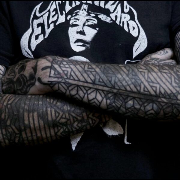 Bold blackwork tattoo by Francesco Capro, featuring strong ornamental patterns and timeless design. Francesco, originally from Northern Italy, works from Nowhere Tattooing in Brighton and Seven Doors Tattoo in London, bringing over thirteen years of experience and a passion for powerful, culturally rich tattoo art.